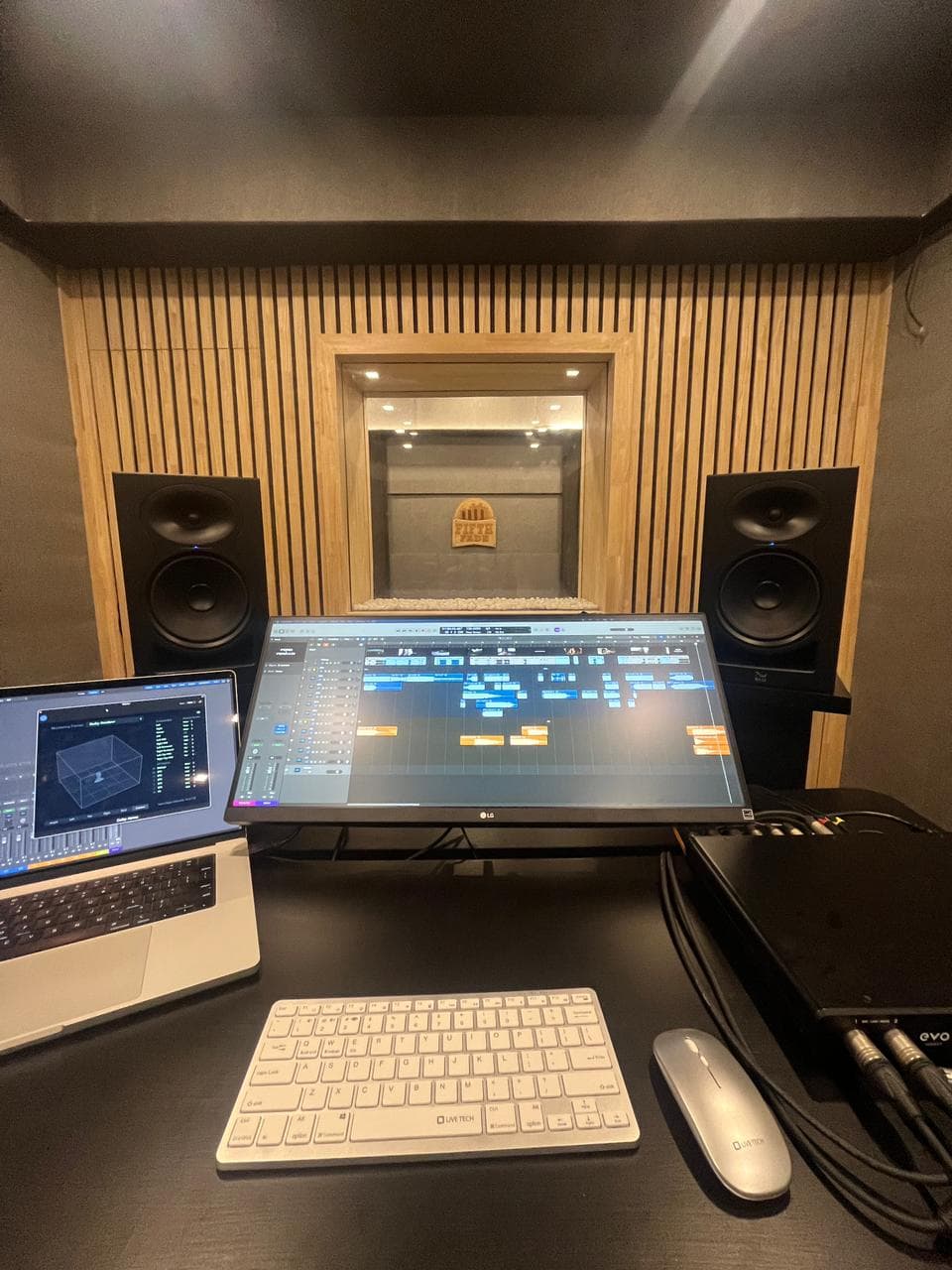 DAW session with Fifth Fade booth through the glass